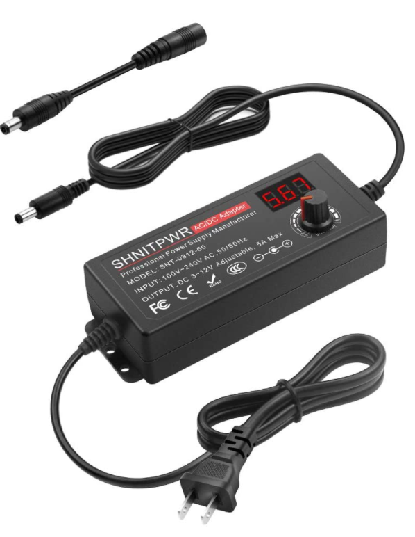 A picture containing adapter, electronics, charger Description automatically generated