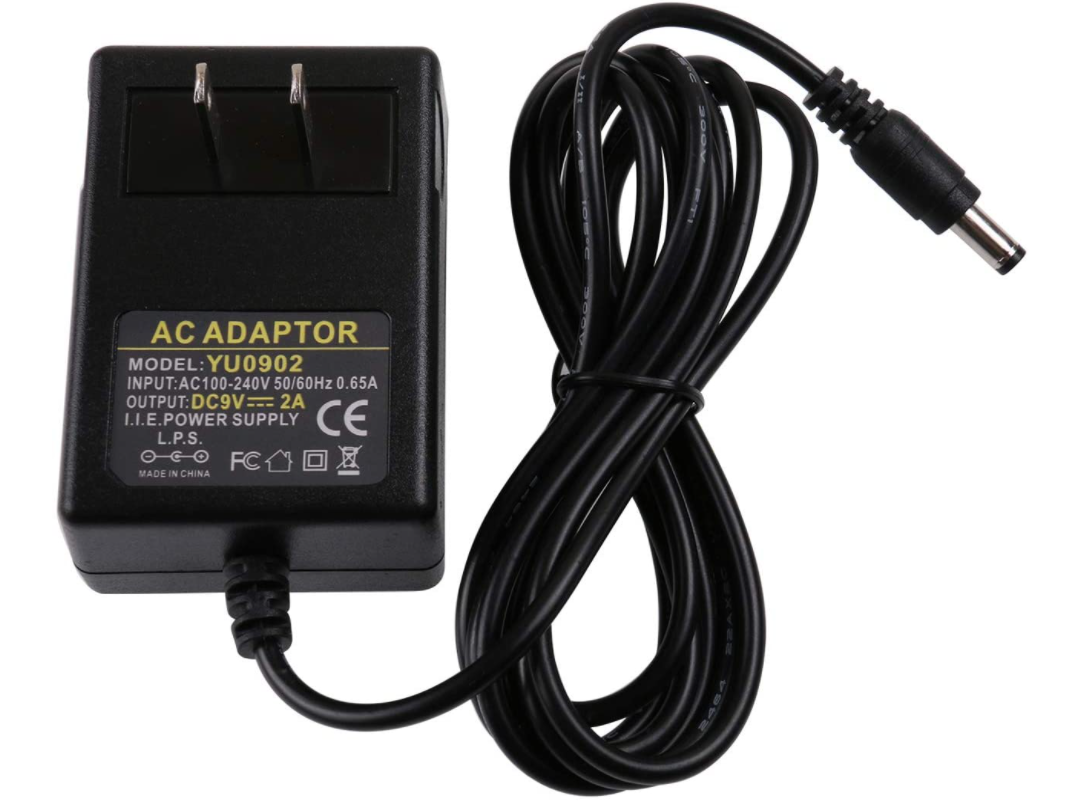 A picture containing electronics, adapter, cable, charger Description automatically generated