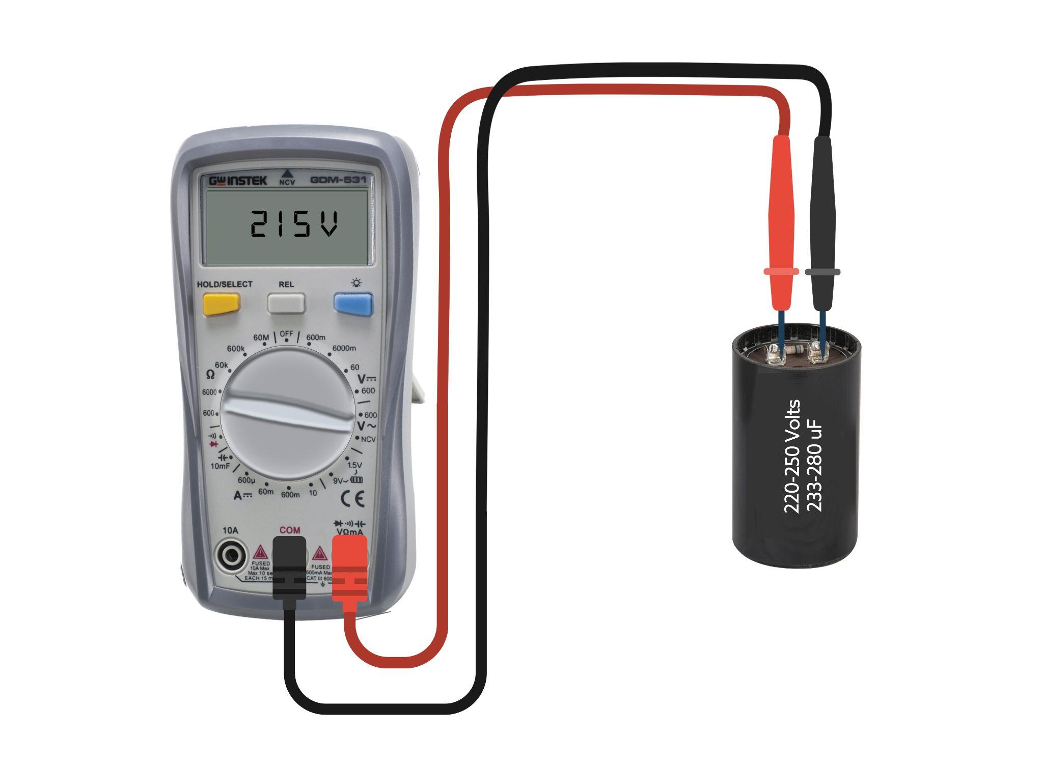 A digital multimeter connected to wires generates details automatically